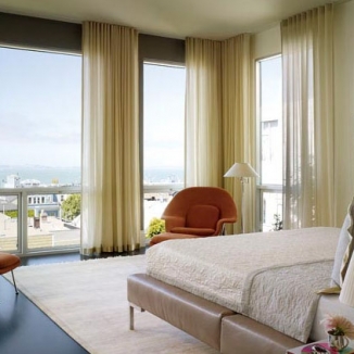 Stitch client Chloe Warner of Redmond Aldrich designed this chic San Francisco home. The sheer floor to ceiling curtains provide privacy but still allow some light in.